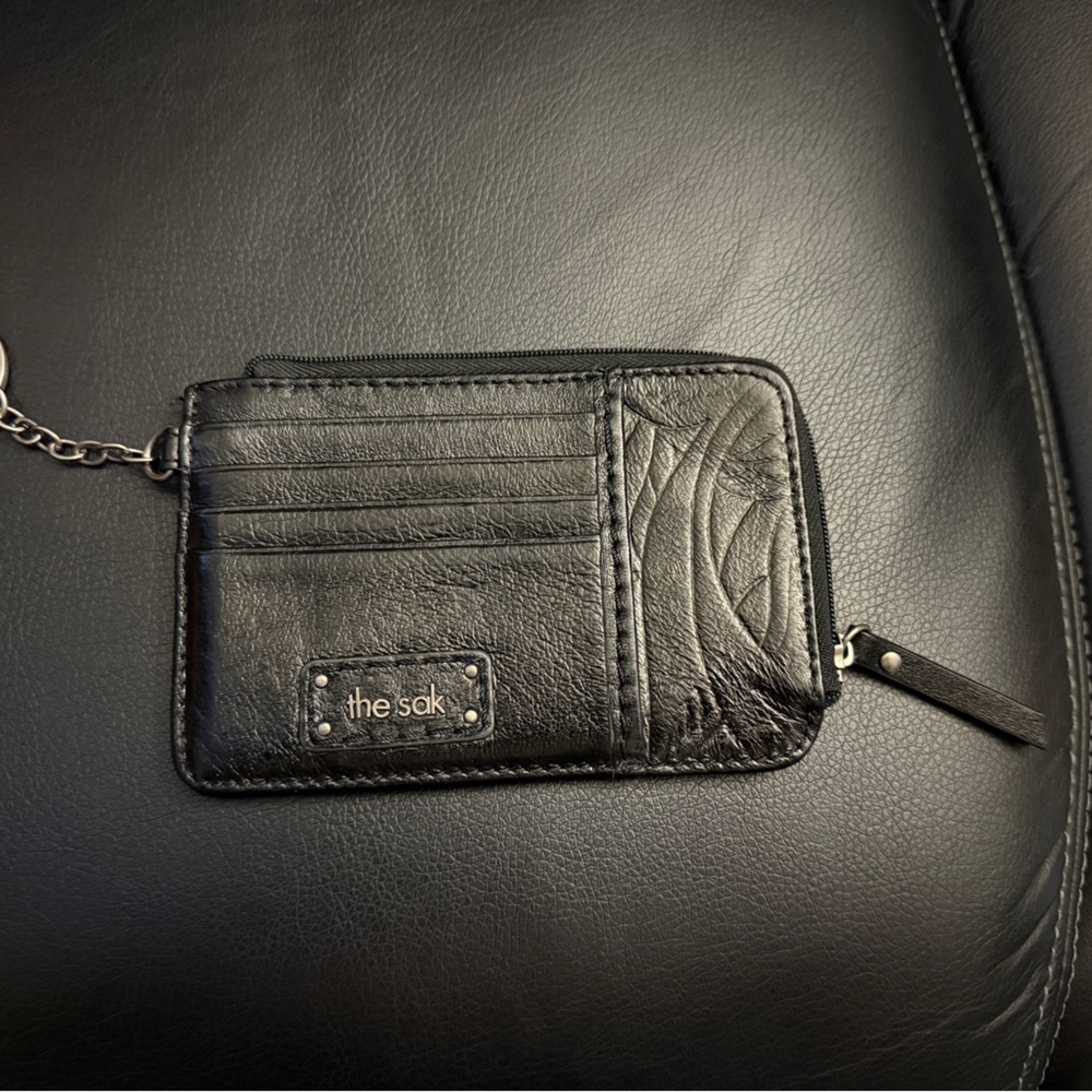 THE SAK wallet in black with keychain and ID window, like new.